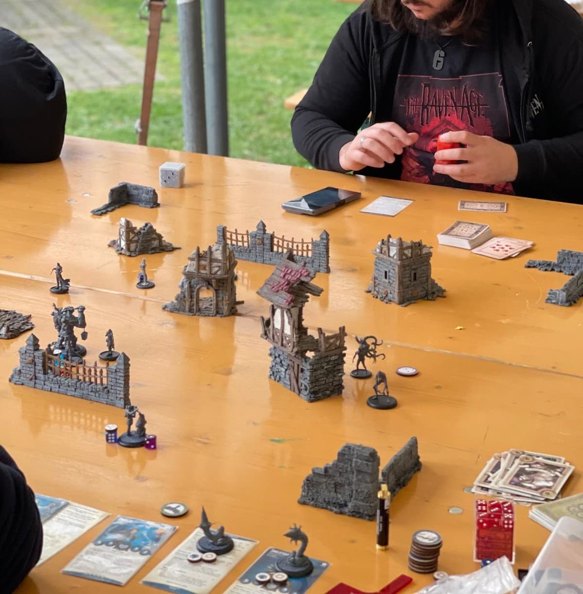 Tabletop strategic game in progress during a KIMA session